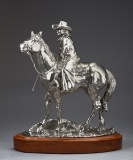 An original Pewter Sculpture by noted Texas artist Kenneth Wyatt titled 