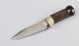 Small Bowie marked parallel to the blade 