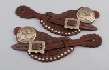 Fancy pair of spotted two piece Straps marked Buddie Foster, Decatur, TX.  Straps have fancy Jerry W