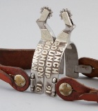 Historic pair of single mounted Spurs (#2607), by the late Jerry Cates with silver engraved overlay