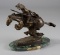 Desk top, Bronze Sculpture, copy of a Frederic Remington piece, title 