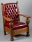 Fine oversized antique oak Arm Chair, circa 1910 with full carved arm supports, recently restored in