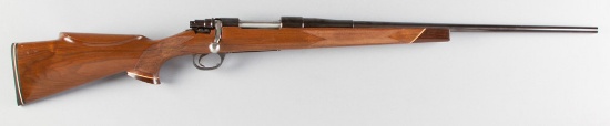 Custom Remington, Model 722, Bolt Action Rifle with custom 24" barrel chambered to a 300 WIN, SN 834