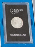 Cased, 1884 Carson City Silver Dollar with paperwork.