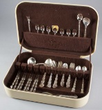 Cased Set of Sterling marked Flatware by Reed & Barton, totaling 49 pieces.  Sold in celluloid type