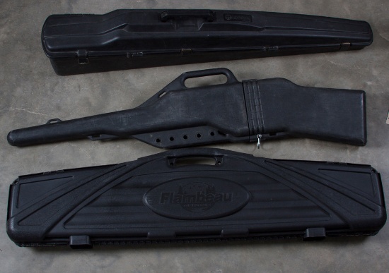 Group of three padded hard plastic Carry Cases for shotguns / rifles, one is an Air Glide by Plano,