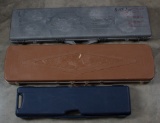 Group of three padded hard plastic Carry Cases for shotgun / rifle, will be sold as one .