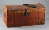 Early leather wrapped, spotted Wild West Show Travel Trunk with domed top, 12