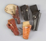 Collection of five tooled and basket weave Holsters showing some use, for various makes, models and