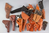 Collection of 16 leather Holsters for both long and short barrel Revolvers for various makes, models
