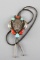 Beautiful silver, turquoise and coral Bolo Tie with raised Buffalo Head in center, and silver tips.