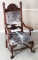 Awesome carved antique, lion head, mahogany Arm Chair, circa 1900, with floral carved relief and ele