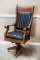 High quality, high back, antique oak Office Chair, with upholstered back and seat, heavy rolled arms