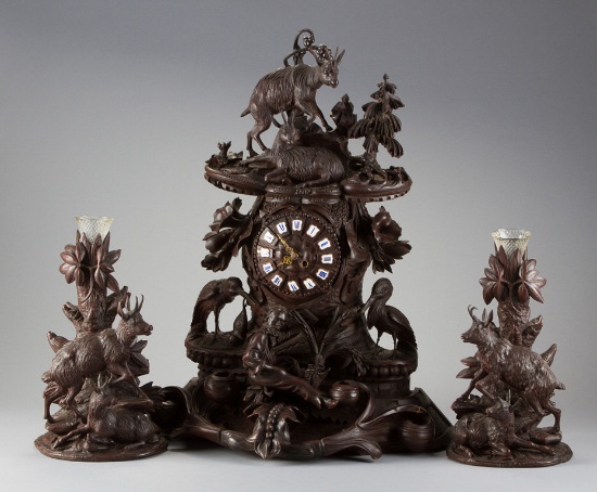 Magnificent Black Forrest, three piece carved Clock Set, circa 1880-1890, with carved animals & foli