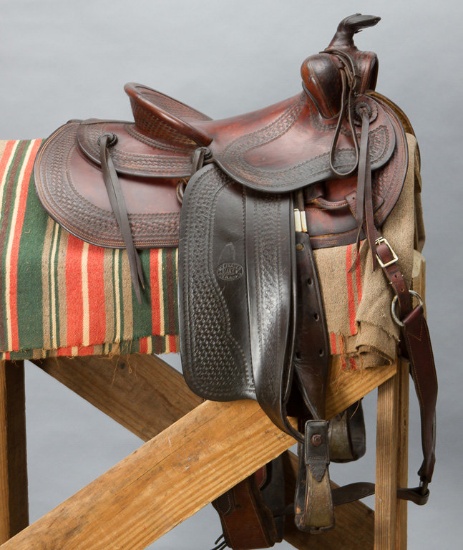 Fine condition "R.T. Frazier, Maker, Pueblo, Colo.", brown Saddle, marked four times, basket weave t
