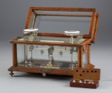 Extremely fine, antique oak case Balance Scales with beveled glass & weights, by Henry Troemner, Mak