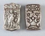 A pair of sterling, heavily embossed, hinged lid Match Safes, circa 1900, both in excellent conditio