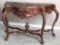 Beautiful, early Victorian Walnut, floral carved Console with unique half turtle top shaped marble t