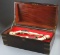 High quality, mahogany Firearm Collector Case with hide away drawer in base.  Case has inlaid brass