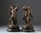 Two spelter Figures with copper flash finish.  One is titled 