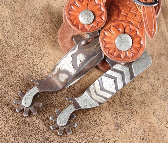 Pair of double mounted Spurs made by the late Jerry Cates, #2077, with silver hand engraved steer he