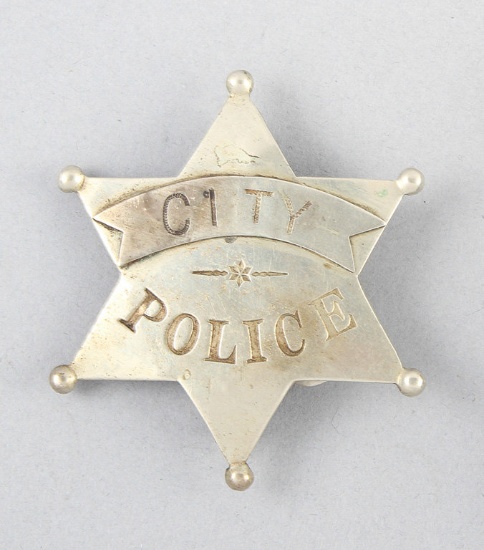 City Police Badge, 6-point ball star with ribbon, 2 5/8" across points, name "E.M. Grady" stamped on