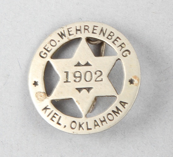 Geo. Wehrenberg #1902 Kiel, Oklahoma Badge, circle star, 1" diameter, small but a very good Oklahoma