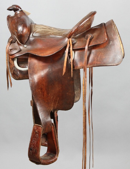 "King Ranch" marked Saddle with 15" seat, 3 1/2" cantle, circa 1950s, overall very good condition, o