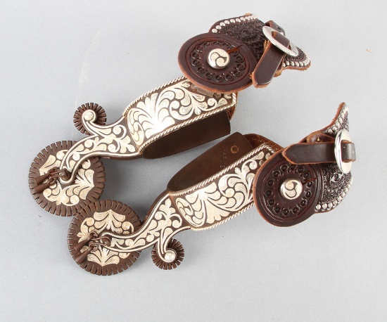 Fancy pair of single mounted, silver inlaid & engraved Spurs in the famous Tom Mix style.  Spurs are