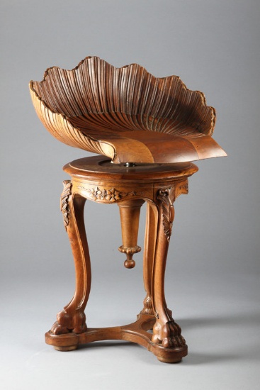 Very ornate and unusual, shield carved Piano Stool with fancy carved claw feet and stretcher base, s