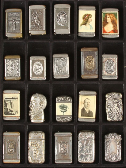 Collection of antique Match Safes, circa 1890s-1900,top three in case left to right have cigar cutte