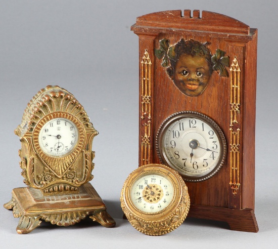 Three miniature Dresser Clocks, circa 1920s.  One is an embossed, round brass Clock, 3" across.  One