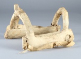 Plains Indian wooden Saddle, circa 1890, wrapped in sinew sewn rawhide.  Great condition.