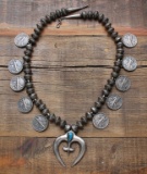 Silver Coin Necklace with small turquoise center drop.  Necklace measures 29