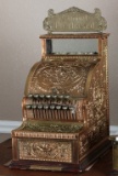 Very desirable brass National Cash Register, Model 310, with scarce embossed brass coin shelf with A