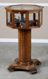 Vintage Oak pedestal Showcase with octagon shaped showcase top, all beveled glass 4 door entry makin