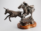 Action Bronze by noted Oklahoma artist Victor Payne, titled 