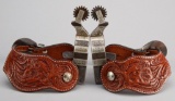 Pair of beautiful double mounted Spurs by noted Texas Artist Pat Ray Castleberry with matching buckl