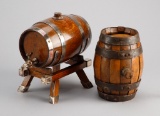 A pair of miniature Whiskey Kegs to include:   One high quality keg on stand with high polish finish