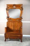 Fancy antique claw foot, oak lift seat Hall Tree with ornate carved mirror and original cast iron ho