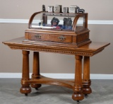 Unique oak, curved glass table top Display Case with desirable storage drawer, double entry at eithe