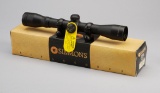 New in box Simmons, .22 MAG Rifle Scope, Model 801022, 4x32 with original paperwork and plastic lens