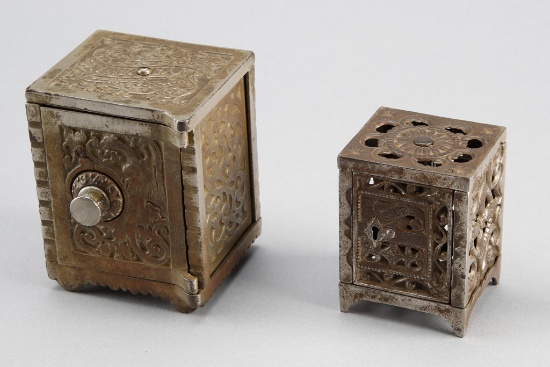 This  consists of two antique cast iron Coin Banks:  One Bank made by Kenton Brand, circa 1910-1920