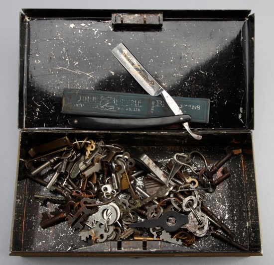 Metal Box  consisting of rings of antique Keys and one "John Primble" marked Straight Razor titled "
