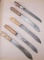 Group of five wooden handled Skinning / Butcher Knives measuring from 13 1/2