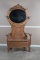 Beautiful antique, quarter sawn oak, lift seat Hall Tree with carved oval mirror and fancy cast iron