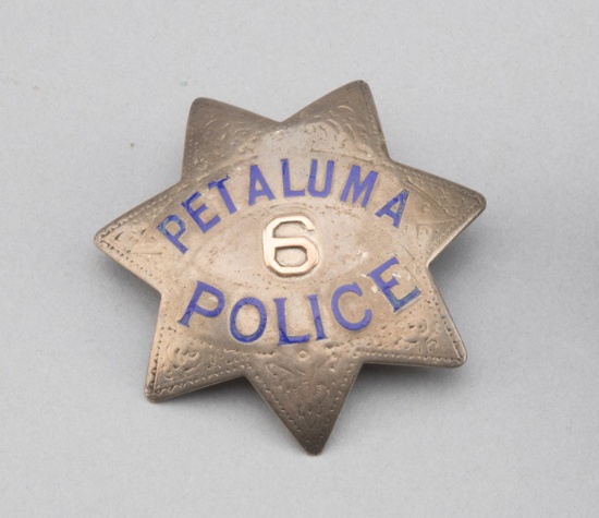 Petaluma Police Badge with gold "6", 7-point star, 3" across points, hallmark "Ed Jones & Co., Oakla