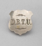 D.B.T.U. Badge, shield shaped, 1