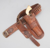 Single Loop, left handed Holster Rig, with border tooled Holster and Skirt for a 5 1/2