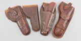Group of four vintage leather Holsters: (1) A Mexican style, double loop Holster for a 7 1/2